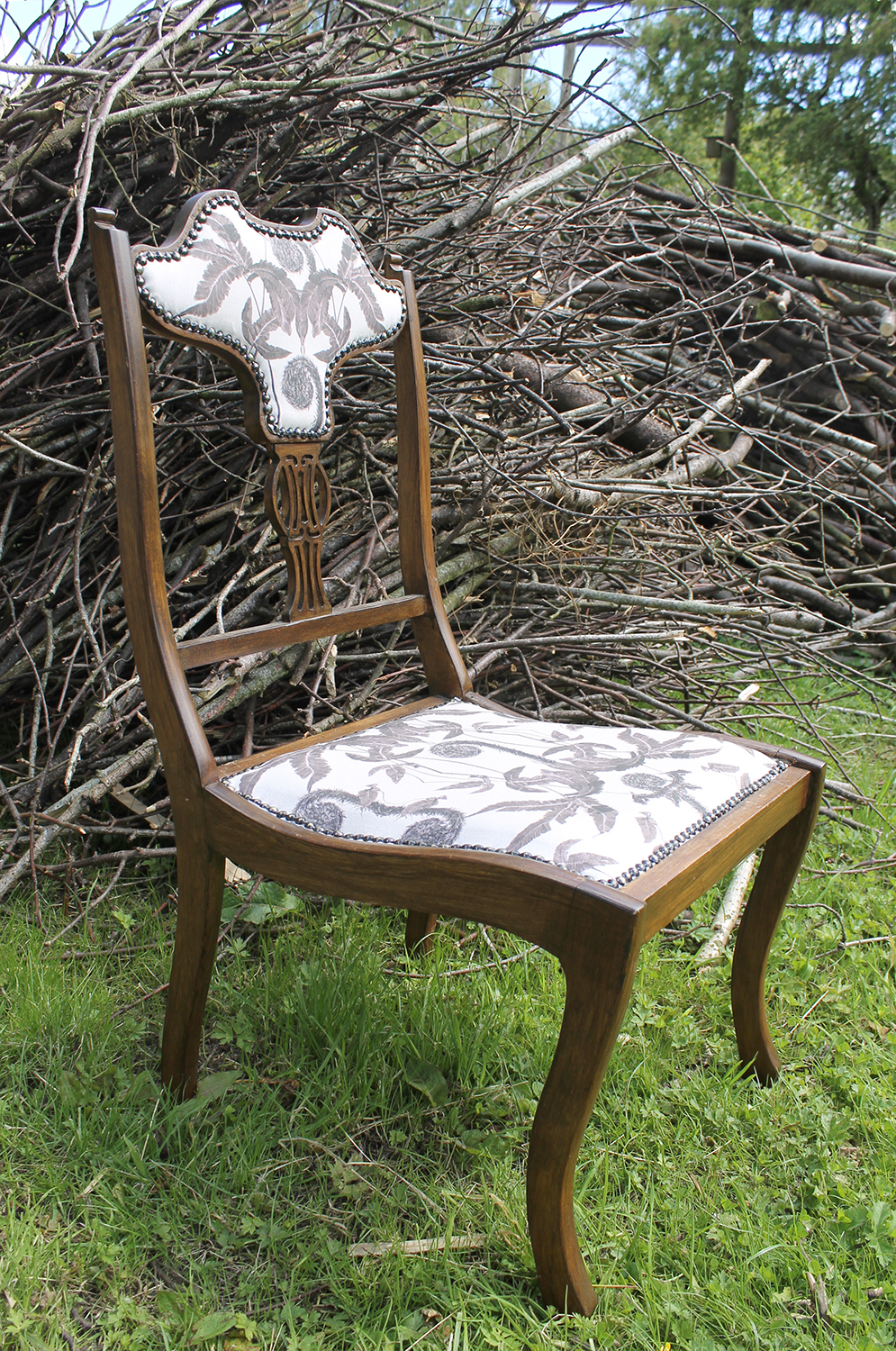 Chair reupholstered with Dark dryopteris fabric designed by Marianne Hazlewood