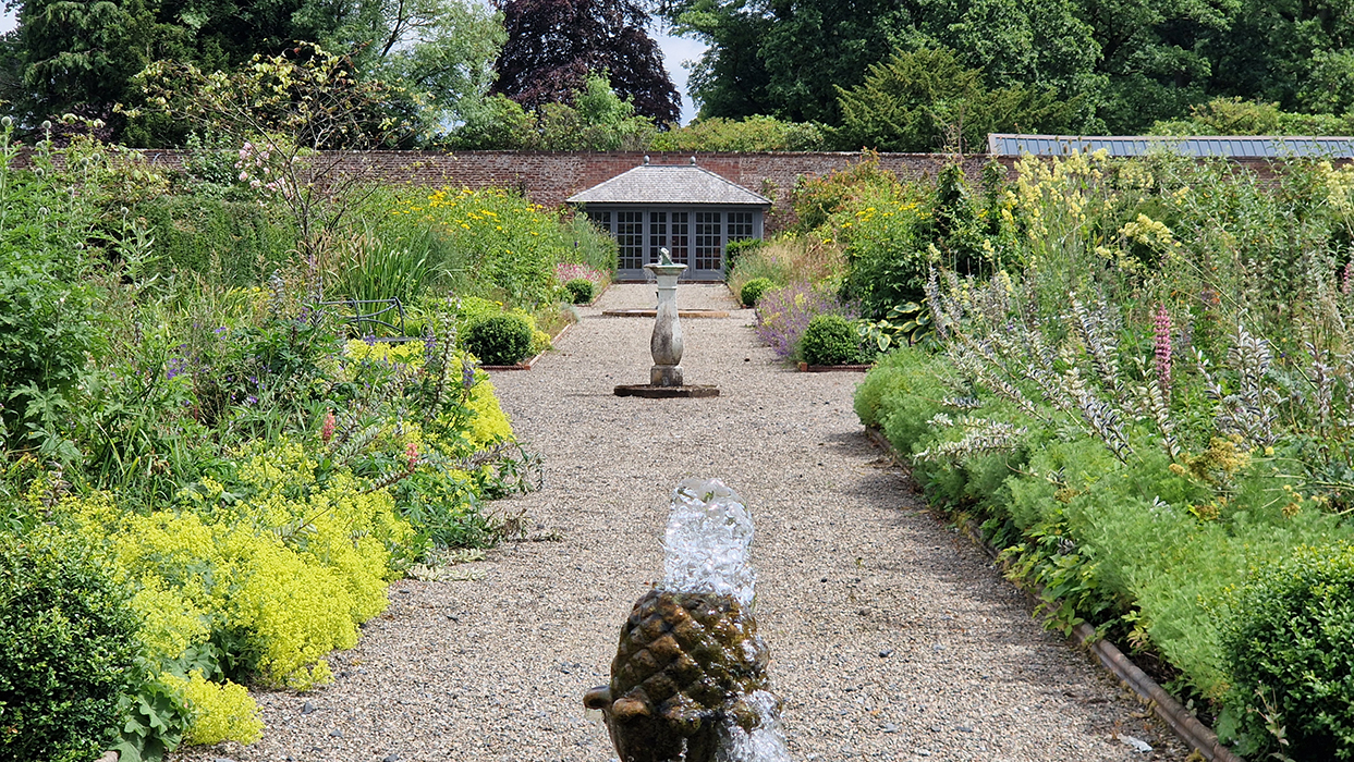 Netherby Hall walled garden, a long walk to the Summer House with central pools and fountains